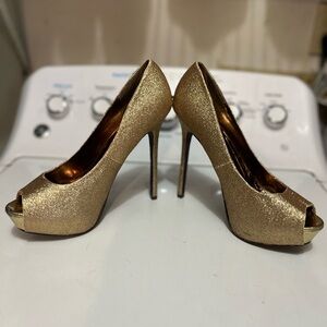 Gold colored stilettos